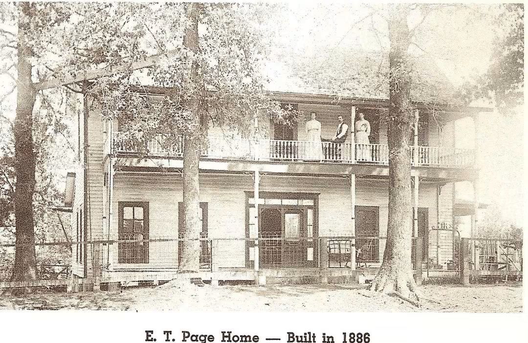 E.T. Page Home, built in 1886, shows a large two-story structure with four people on the balcony amidst lush trees, highlighting architectural heritage.